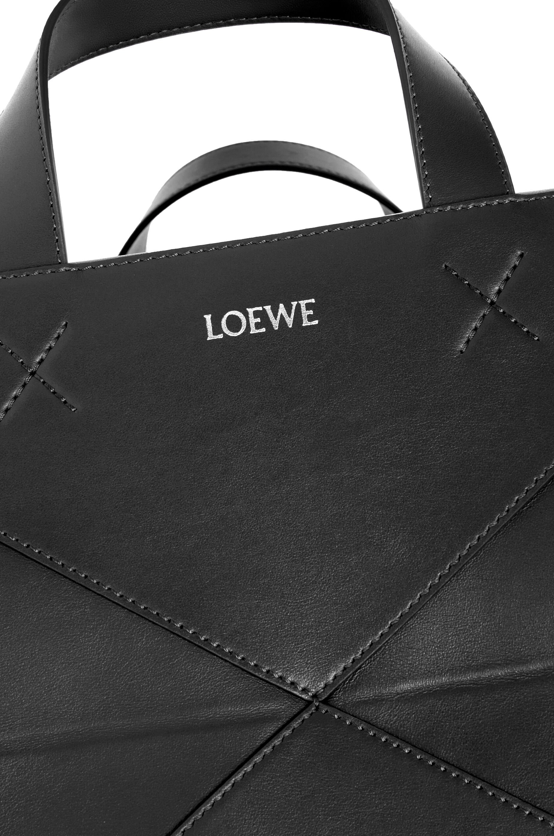 Medium Puzzle Fold duffle in shiny calfskin